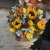 Композиция в сумке "Тональность" из подсолнухов, калл, ягод вибирнума, лимонных роз, скиммии и орхидеи в Дмитрове Композиция в сумке "Тональность" из подсолнухов, калл, ягод вибирнума, лимонных роз, скиммии и орхидеи в Дмитрове