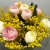 Букет "Маффин" из ранункулюсов и мимозы в Дмитрове
