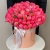 Композиция в шляпной коробке из 113 пионов Корал Шарм в Дмитрове